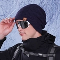 Women's dark purple winter knit beanie with ear protection and a mountain leather patch - Navy Blue