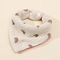 Detail of four-layer cotton baby bib with rainbow print and double plastic snap buttons - Gray Rainbow + Dusty Rose