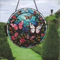 Detail view of colorful butterfly and rose pattern on round glass-style wall ornament - Butterfly and Rose