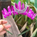 Detailed view of handmade black moon crown with purple crystals and wire wrapping - Purple-Red Crystal with Silver Wire & Moon