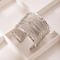 Bracciale rigido stile boho in argento con trama a corda e cristalli lucidi - Argento