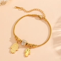 18K vergoldetes Edelstahl-Hamsa-Armband mit funkelnden Kristallakzenten für Damen - Goldarmband (D819)