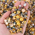 Mixed set of gold, white and black flatback pearls with rhinestones for DIY nail art and crafts - Half-circle Pearl Mixed With Gold And Black Ab Series - V / 30 g