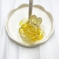 Translucent yellow flower hair claw clip in rose shape on white wavy tray - Yellow (Transparent Rose)