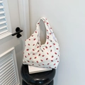 Chic off-white corduroy tote bag featuring vibrant red strawberry print for casual wear - Strawberry Style