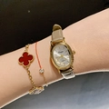 Elegant Dinimi women's quartz watch with gold oval case and beige leather strap - Leather Strap / Gold Case/Grey Strap
