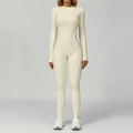 Crèmekleurige yoga bodysuit met lange mouwen en contournaden voor atletische vorming - S / Crème Abrikoos