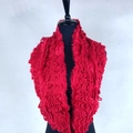 Red cashmere-like knit scarf with textured wave pattern on a black mannequin - XLB-014 Red