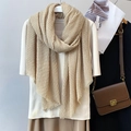 Beige pleated cotton linen scarf with frayed edges styled over a casual summer outfit - Beige