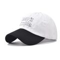 Detailed view of 'keep it simple' embroidery on a two-tone cotton baseball cap - Adjustable / White/Black
