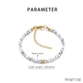 Primer plano de pulsera de cuentas de mármol blanco con cadena de extensión y cierre dorado - Estilo de Mármol Blanco Dorado (KB207127-Z)