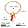 Detailed view of gold stainless steel bracelet with chili, pearl and lightning charms - Gold Chili Pearl Lightning Style (JDB2408023)