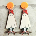Detail of quirky Halloween ghost on a skateboard dangle earrings with orange stud - Ghost Skateboard Print