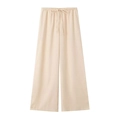 Detail of beige linen wide leg trousers with adjustable drawstring waist and relaxed fit - XS / Bottoms / Off White