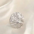 Macro detail of silver ring with hammered metal texture on silk fabric background - Round Hammered / Silver