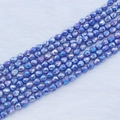 Macro view of blue faceted heart-shaped crystal beads with iridescent coating for DIY jewelry - 4*5mm (Approx 95pcs/strand) / Medium Blue AB