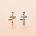 Macro view of gold and silver cross nose studs with micro-pave cubic zirconia crystals - Cross (4#)