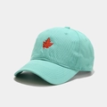 Close-up of red maple leaf embroidery on soft cotton mint green baseball cap fabric - Adjustable / Teal
