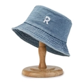 Blue denim bucket hat with white R letter embroidery on wooden stand display - Letter R Light Blue