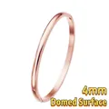 Detail view of 4mm domed rose gold stainless steel bangle with a polished finish - Simple Domed Surface (Rose Gold) / 4mm Width