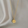 Golden round titanium necklace with Fu character pendant on elegant silk background - Fu Character Necklace