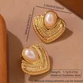 Vintage stainless steel heart earrings with textured frame and pink pearl center - Stainless Steel Pearl Heart Twisted
