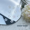 Detail of 8mm heart and star shaped nail art sequins with reflective mirror effect - Hollow Silver Glitter Star / 8MM*8MM