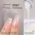 Vernis gel végétal F087 Hibiscus avec paillettes irisées et finition blanc laiteux - F087 Floraison d'Hibiscus