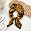 70cm square silk scarf with elegant gold baroque print on black fabric tied in a bow - 70cm / Black Baroque Rope