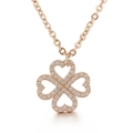 Elegant rose gold clover necklace with heart-shaped pendants and sparkling crystals - Rose Gold Four Heart Hollow Clover Necklace(KN29815-K)