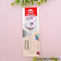 Metallic purple number 3 birthday candle in retail packaging on pink background - Rose Gold Number 3