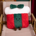 Christmas plush pillow shaped like a gift box with red and green patchwork and smiley face - Gift Box / 30cm