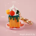 Mini-Kuchen-Schlüsselanhänger in Orange mit Obst-Deko und Karabiner, 5,5cm hoch - Grüne Creme mit goldenem Schlüsselring