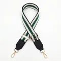 Detail of adjustable green and white striped canvas strap with black leather and gold hooks - Black Base Green + Black Leather