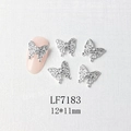 Macro shot of 3D silver butterfly nail charms with micro-pave crystals on pink nails - Silver Micro-Pave Full Rhinestone Butterfly (7183)