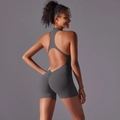 Detail view of backless cross design and scrunch butt feature on grey yoga romper - S / Top And Bottom / Dark Gray