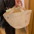 Close-up of quilted cream canvas bag featuring elegant orange tulip embroidery detail - Tulip Embroidery (Small)