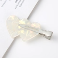 Close-up of heart-shaped acetate hair clip with iridescent pearl finish on metal alligator clip - 22# Cream White Pearlescent Double Heart / 6cm
