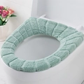 Thick mint green knitted toilet seat cover with pumpkin texture and elastic hem - Nordic Green