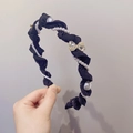 Elegant twisted pearl headband with black pleated fabric and rhinestone butterfly detail - 220405 Rhinestone Black