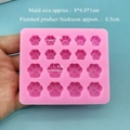 Pink silicone mold featuring two rows of 16 mini cat paw cavities for DIY resin crafts - Silicone / 18-Cavity Cat Paws - Pink