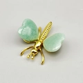 Gold insect brooch with green heart-shaped crystal wings and metallic body details - Aventurine Jade