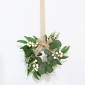 Easter wreath with faux eucalyptus leaves, white berries and a natural burlap bow - White Berry Eucalyptus Willow Wreath with Linen Bow