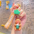 Cute Capybara keychain with milk tea design, green turtle pendant, and orange strap - Resin Capybara - Milk Tea