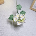 Handmade white crochet pansy flower with yellow center and green leaves - Green