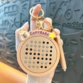Adorable beige cartoon Capybara keychain fidget game toy with a circular button board - Stress Relief Board - Star