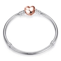 Classic silver snake chain bracelet with a rose gold heart-shaped clasp closure - Heart Rose Gold