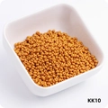 Macro detail of 3mm orange glass seed beads in a white bowl for DIY bracelet making - KK10 Light Brown