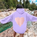 Unisex purple fleece hoodie featuring pink Love Your Self heart back print in nature - Lavender