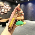 Capybara keychain with brown silicone strap and 3D figure riding a turtle - B207-2 Riding Turtle